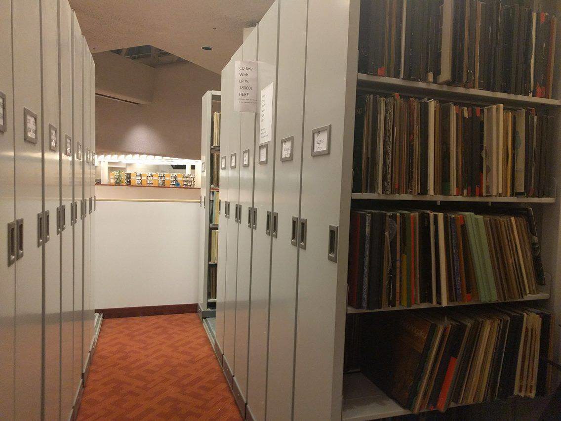 Rows of tall cabinets holding records at Toronto Reference Library.