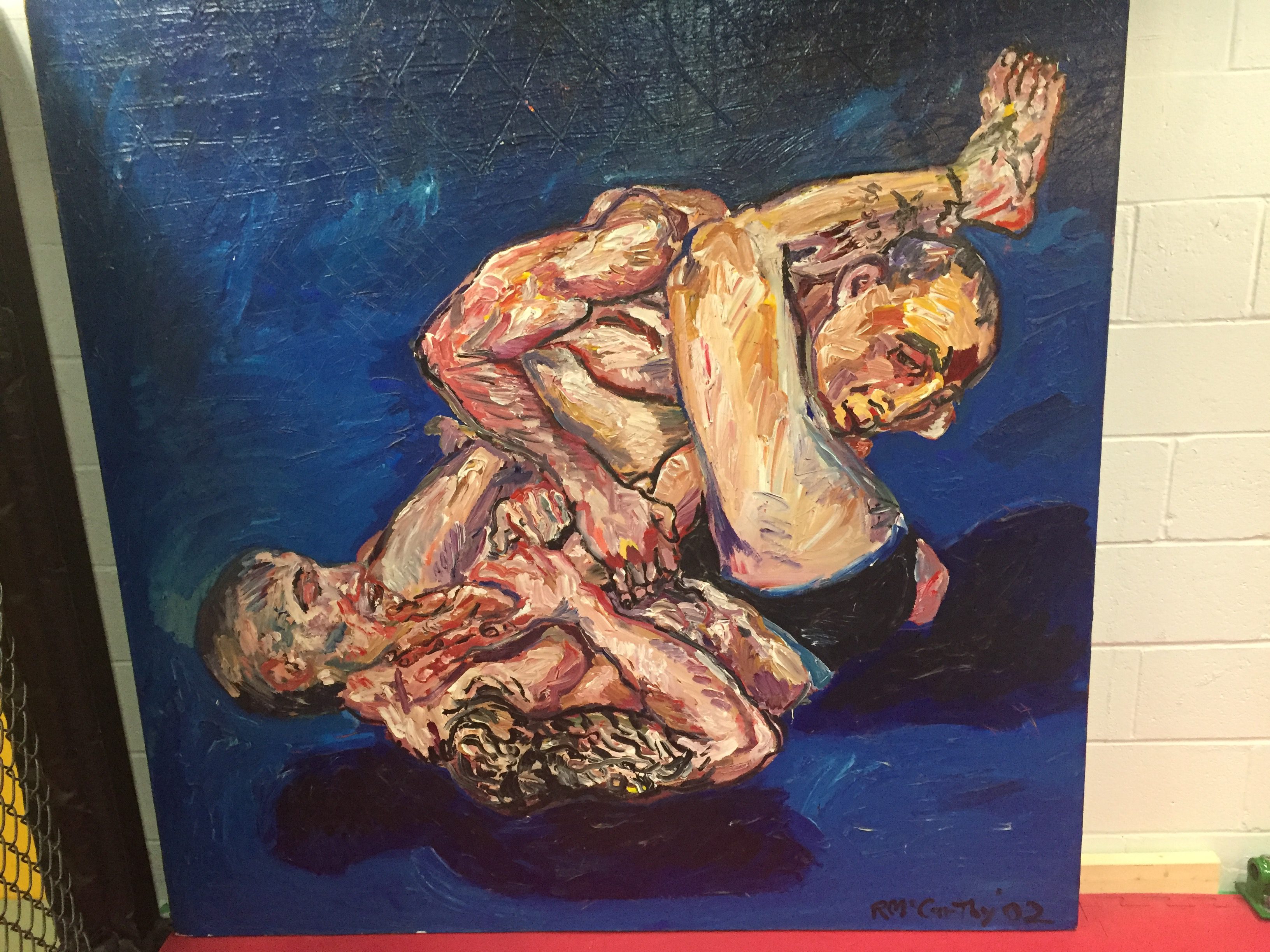 Painting of two men wrestling by Rick McCarthy.