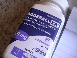 Purple pill bottle for Adderall XR.