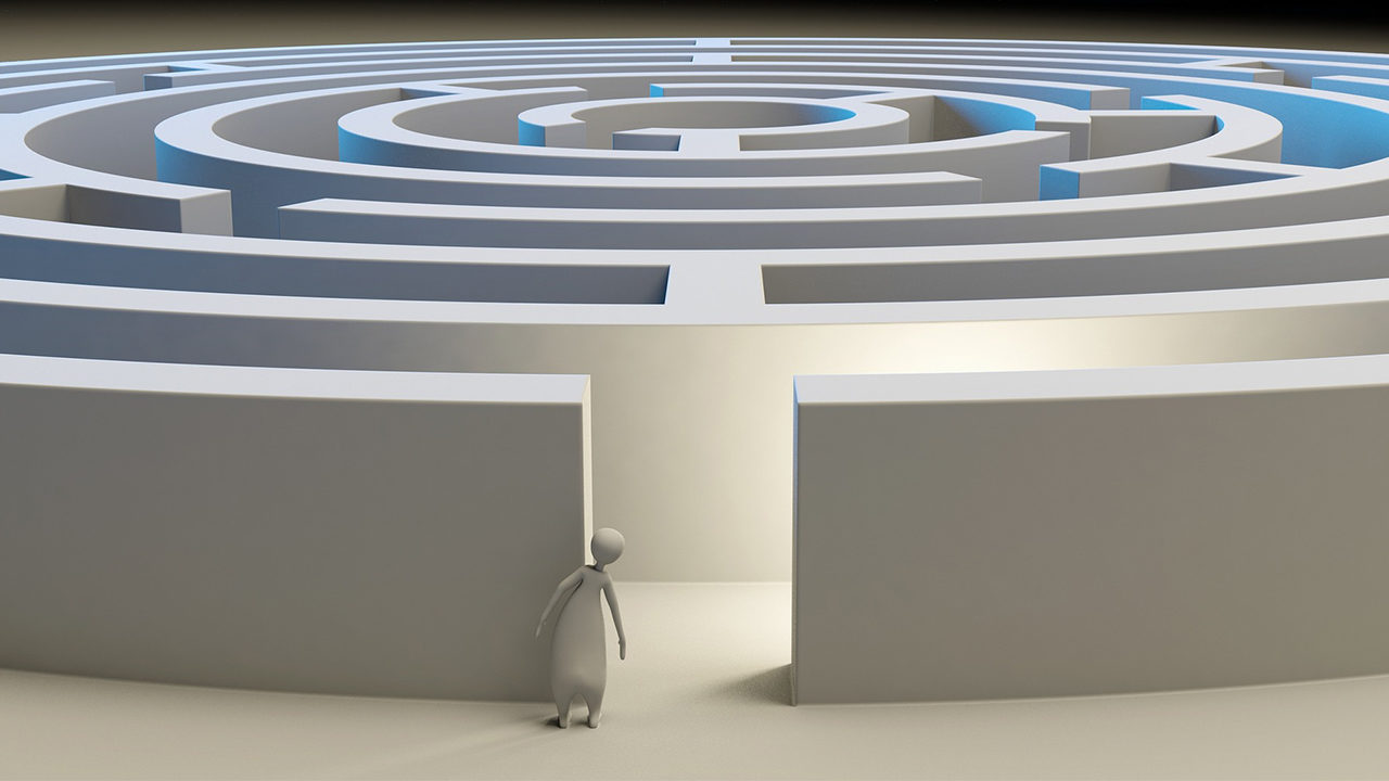 Digital drawing of person peering into large blue and grey maze.