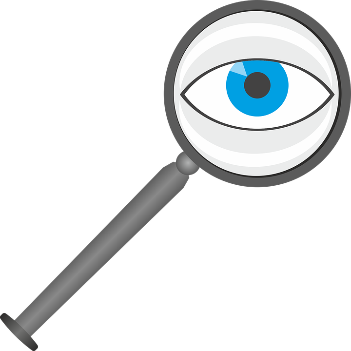 Drawing of grey magnifying glass with blue eye in centre.