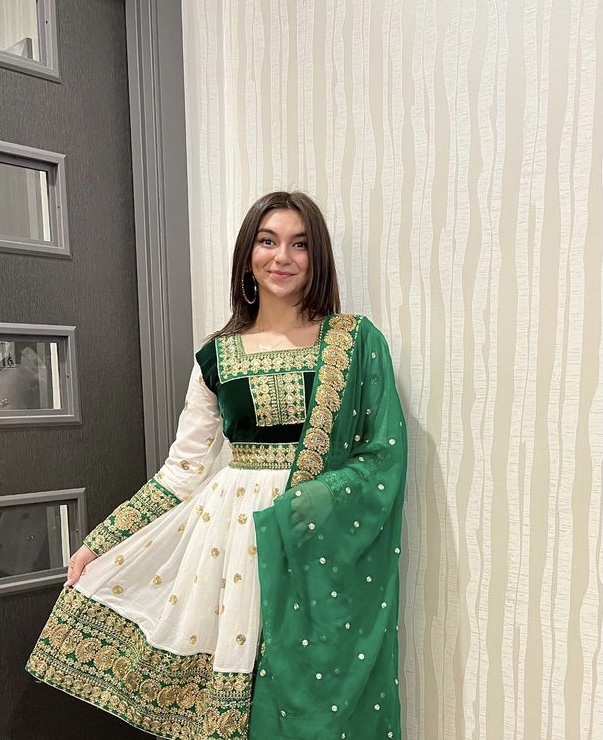 Omrah Faqiryar celebrating her identity through her traditional Afghan attire