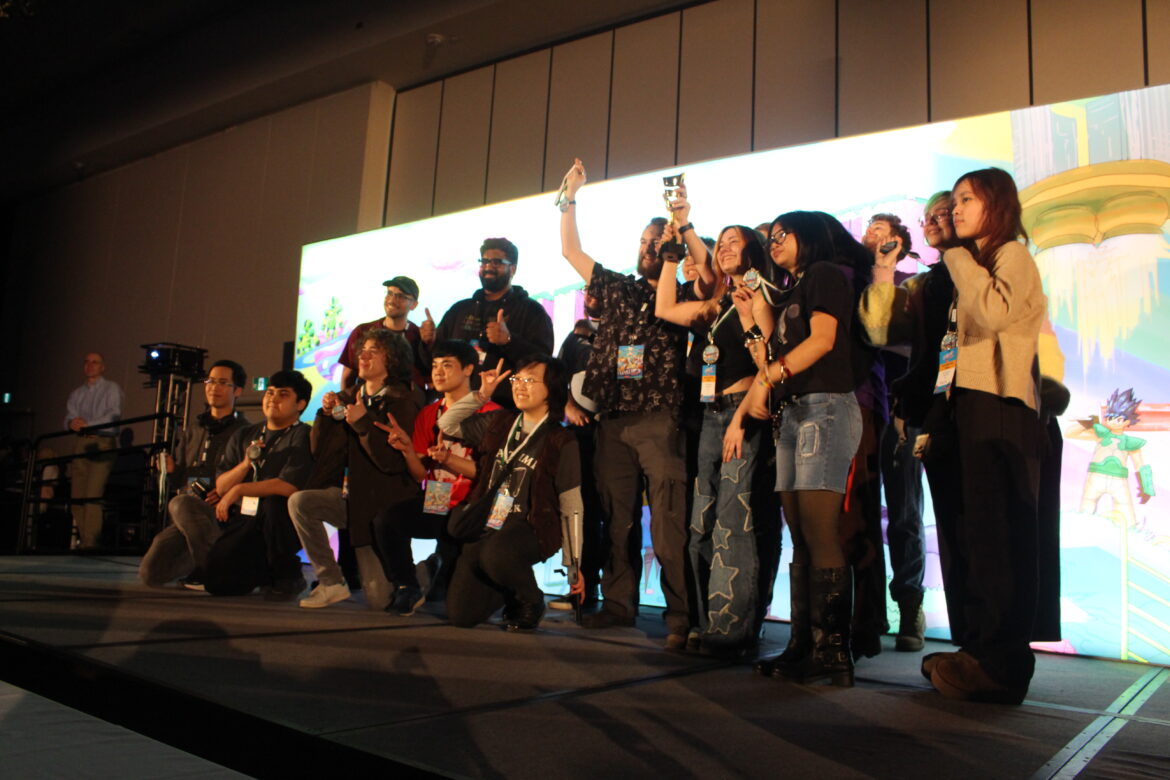 The Metropolitan Game Studio posing at Level Up Showcase 2026 for winning second place for people's choice.