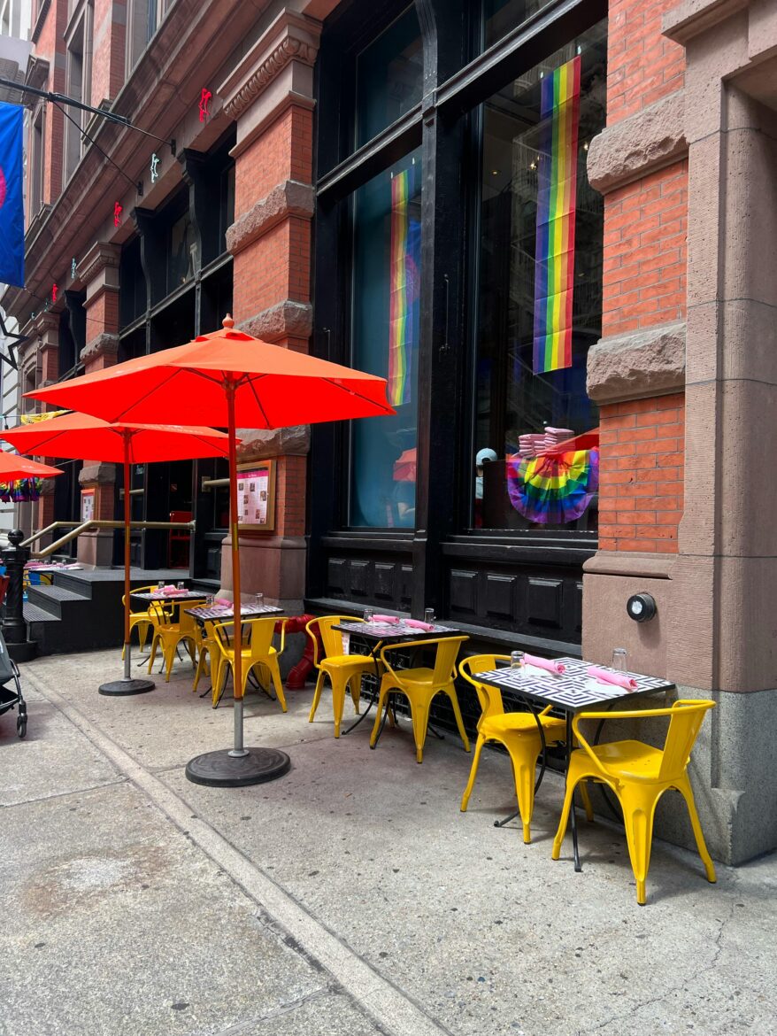 Patio area of a restaurant with umbrellas 